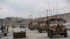 FILE - In this file photo dated March 25, 2020, British troops with NATO-led Resolute Support Mission forces in Kabul, Afghanistan. Gen. Sir Richard Barrons told the BBC Newsnight that failing to relocate the Afghans who worked with the British in Afghanistan “is a disgrace.” 