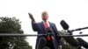 President Donald Trump speaks to members of the media on the South Lawn of the White House in Washington, Oct. 3, 2019.