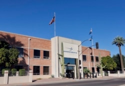 This Nov. 14, 2013, photo, shows the main entrance of the Lockheed Martin plant in Goodyear, Ariz.
