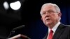 Attorney General Jeff Sessions speaks during a news conference to announce a criminal law enforcement action involving China, at the Department of Justice in Washington, Nov. 1, 2018. 