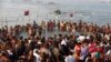 Indian Hindu devotees gather to take holy dips at Sangam, the confluence of the Rivers Ganges, Yamuna and mythical Saraswati on Maghi Purnima, or the full-moon day of the month during the annual "Magh Mela" fair in Allahabad, Feb. 10, 2017.