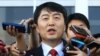 Lee Seok-ki of the leftist Unified Progressive Party speaks before leaving the National Assembly in Seoul, South Korea, Sept. 4, 2013. 