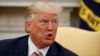 FILE - President Donald Trump speaks during a meeting in the Oval Office of the White House, Aug. 20, 2019. 