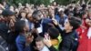 France's defender Benjamin Mendy is congratulated by supporters during a reception at the Elysee Presidential Palace after they won the Russia 2018 World Cup final football match, in Paris, France, July 16, 2018. 