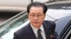 FILE - Jang Song Thaek exits a car as he arrives at the Ziguangge building of Zhongnanhai, the central government compound, in Beijing, Aug. 17, 2012.