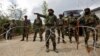 FILE - Indian army soldiers stand guard inside their army base after it was attacked by suspected separatist militants in Panzgam in Kashmir's Kupwara district, April 27, 2017. 