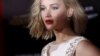 Cast member Jennifer Lawrence poses at the premiere of "The Hunger Games: Mockingjay - Part 2" in Los Angeles, California Nov. 16, 2015. 