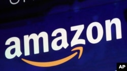 En esta foto de archivo de julio 27 de 2018, el logo de Amazon se ven en una pantalla en el sitio de mercadeo de Nasdaq. 