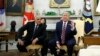President Donald Trump speaks with members of the press as he meets with Bulgarian Prime Minister Boyko Borissov in the Oval Office of the White House, Nov. 25, 2019, in Washington.