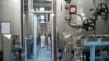 FILE - A technician is seen at the uranium conversion facility in Isfahan, 450 kilometers south of Tehran, Iran, Feb. 3, 2007. 