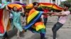 Members of the LGBT community dance to celebrate after the country's top court struck down a colonial-era law that made homosexual acts punishable by up to 10 years in prison, in Bangalore, India, Sept. 6, 2018. 