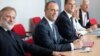 Britain's Secretary of State for Exiting the European Union Dominic Raab (C) and Britain's ambassador to the EU Tim Barrow (L) attend a meeting with EU's chief Brexit negotiator Michel Barnier in Brussels, Belgium, July 19, 2018.