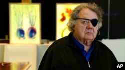 Glass artist Dale Chihuly poses for a photo in one of his studios in Seattle, March 22, 2017. 
