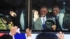 FILE - South Koreans on a bus bid farewell to their North Korean relatives after temporary family reunions at Mount Kumgang resort in North Korea.