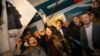 Candidate for the Pe a Corsica nationalist party Gilles Simeoni (C) celebrates with supporters in Bastia, on the French Mediterranean Island of Corsica, Dec. 3, 2017, after the results of the first round of the election were announced. 