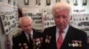 Golosiivskyy district veterans' council head Sergei Koropov (right) in Kyiv, Ukraine. 