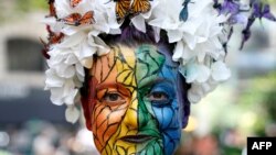 FILE - People gather for the 3rd annual Queer Liberation March in New York, June 27, 2021.