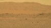 FILE - In this image from NASA, NASA's experimental Mars helicopter Ingenuity lands on the surface of Mars, Apr. 19, 2021. 