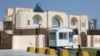 FILE - The new office of the Afghan Taliban in Doha, Qatar is seen after the opening of the office, June 20, 2013 . 