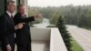 Turkey's President Recep Tayyip Erdogan, right, points toward the city center as he speaks with NATO Secretary General Jens Stoltenberg during a meeting of NATO's Mediterranean Dialogue, in Ankara, Turkey, Monday, May 6, 2019. 