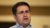 El presidente hondureño Juan Orlando Hernández envía un mensaje luego de que su hermano Juan Antonio "Tony" Hernández fuera declarado culpable de narcotráfico en Estados Unidos, en Tegucigalpa. [Archivo]