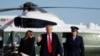 El presidente de los Estados Unidos, Donald Trump, y la primera dama Melania Trump se preparan para abordar el Air Force One cuando parten de Washington hacia la India desde la Base Conjunta Andrews en Maryland, EE.UU.