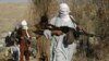 FILE - Armed Taliban fighters are seen at an unidentified location in Nangarhar province, Afghanistan, Dec.13, 2010. Taliban fighters are currently launching a new spring offensive.