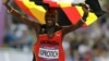 Uganda's Stephen Kiprotich celebrates after crossing the finish line to win gold in the men's marathon at the 2012 Summer Olympics Sunday, Aug. 12, 2012, London. 