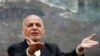 FILE - Afghan President Ashraf Ghani speaks during a news conference in Kabul, Afghanistan, July 15, 2018. He telephoned neighboring Pakistan’s would-be prime minister, Imran Khan, to congratulate him on his election victory and invited him to visit Kabul. 