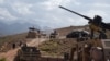 FILE - In this photo taken on July 7, 2018, US Army from NATO and Afghan commando forces are pictures in a checkpoint during a patrol against Islamic State militants at the Deh Bala district in the eastern province of Nangarhar Province.