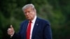 FILE - President Donald Trump gestures as he walks across the South Lawn of the White House in Washington, May 30, 2020.