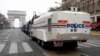 A French police water cannon vehicle is in place on the Champs-Elysees during the the 19th consecutive national protest Saturday of the "yellow vest" movement in Paris, March 23, 2019.