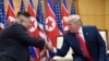 FILE - U.S. President Donald Trump meets with North Korean leader Kim Jong Un at the Korean border village of Panmunjom, June 30, 2019.