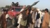 Taliban fighters gather in Surkhroad district of Nangarhar province, east of Kabul, Afghanistan, June 16, 2018.