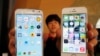 FILE - Smartphones