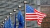 FILE - A U.S. and European Union flags are pictured during the visit of Vice President Mike Pence to European Commission headquarters in Brussels, Belgium, Feb. 20, 2017.
