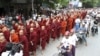 Burma Buddhist monks stage a rally to protest against ethnic minority Rohingya Muslims and to support Burma President Thein Sein's stance toward the sectarian violence that took place in June between ethnic Rakhine Buddhists and Rohingya Muslims, Septembe