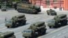 FILE - Russian S-400 surface-to-air missile defense systems are on display during a parade at Red Square in Moscow, Russia, May 9, 2015.