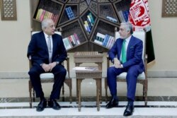 U.S. special representative for Afghanistan, Zalmay Khalilzad, left, meets with Afghanistan Chief Executive Abdullah Abdullah in Kabul, Afghanistan, Sept. 2, 2019.