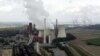 FILE - View to the brown coal power plant of German energy company RWE in Neurath, western Germany, Aug. 27, 2007.