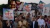 Lawmakers and supporters of Pakistan's opposition Party Pakistan Muslim League headed by ousted prime minister Nawaz Sharif, stage a protest outside Parliament House in Islamabad, Pakistan, condemning the arrest of their leaders, Oct. 11, 2018. They demanded the immediate release of their leaders and criticized the Imran Khan's government, seeking loan package from the International Monetary Fund. IMF team to visit Pakistan after request for bailout loans.