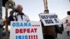 Raul Rodriguez Jr., left, of America First Latinos protests against the Islamic State group ahead of President Barack Obama's visit with the families of shooting victims in San Bernardino, Calif., Dec. 18, 2015. 