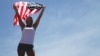 Athletic woman with a US flag