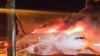 Fire authorities work to extinguish a fire that broke out on an Air Busan passenger plane at Gimhae International Airport in Busan on January 28, 2025. (Photo by YONHAP / AFP)