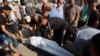 Ataques en centro de Gaza matan a 13 palestinos mientras avanzan las conversaciones de alto el fuego