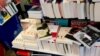 A selection of this fall's novels is stacked at L'Alba bookstore in the French town of Ile Rousse. (L. Bryant/VOA)