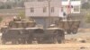Turquía se niega a intervenir sola en Kobani