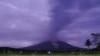 Volcanic materials spew from the crater of Mount Semeru in Lumajang, East Java, Indonesia, Dec. 1, 2020. 