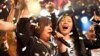In this Jan. 14, 2014 photo, Rose Fostanes, a 47-year-old Filipino caregiver, sings during the X-Factor Israel in Tel Aviv, Israel. 