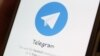 FILE - The Telegram logo is seen on a screen of a smartphone in this illustration, April 13, 2018.